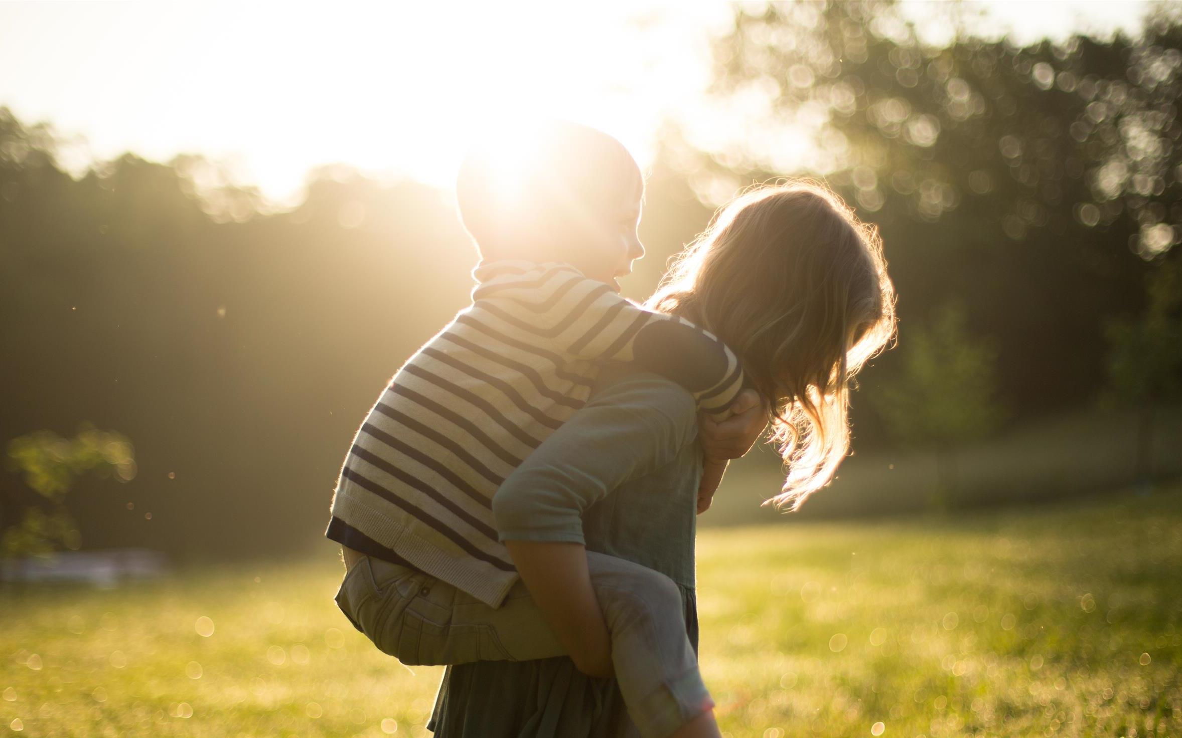 Children playing outside in summer