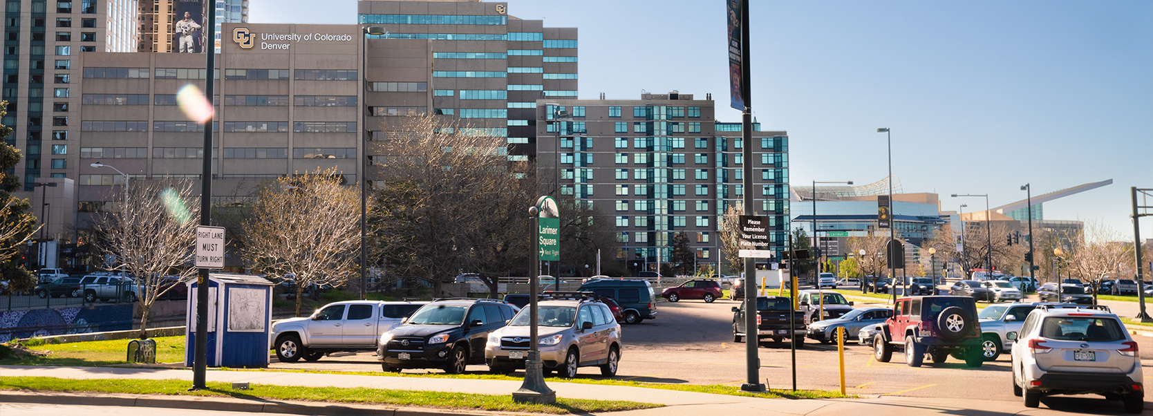 Pay lot with cars off of Speer Boulevard