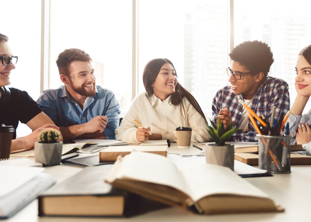 Group of diverse students studying.