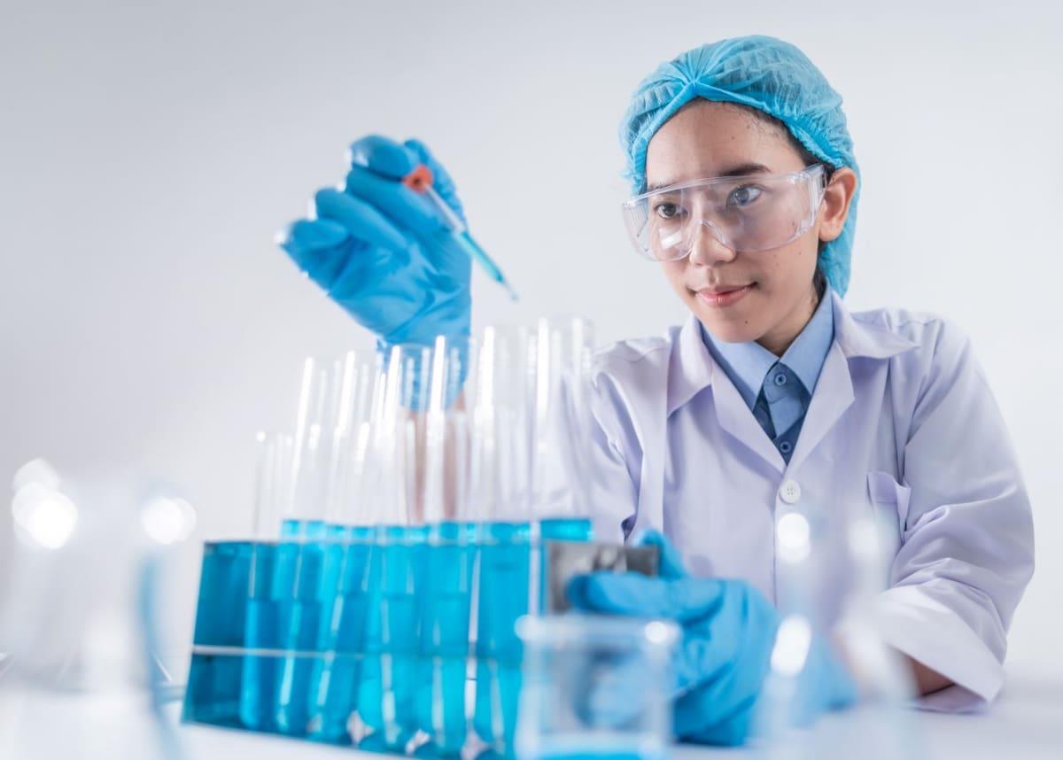 scientist working with test tubes