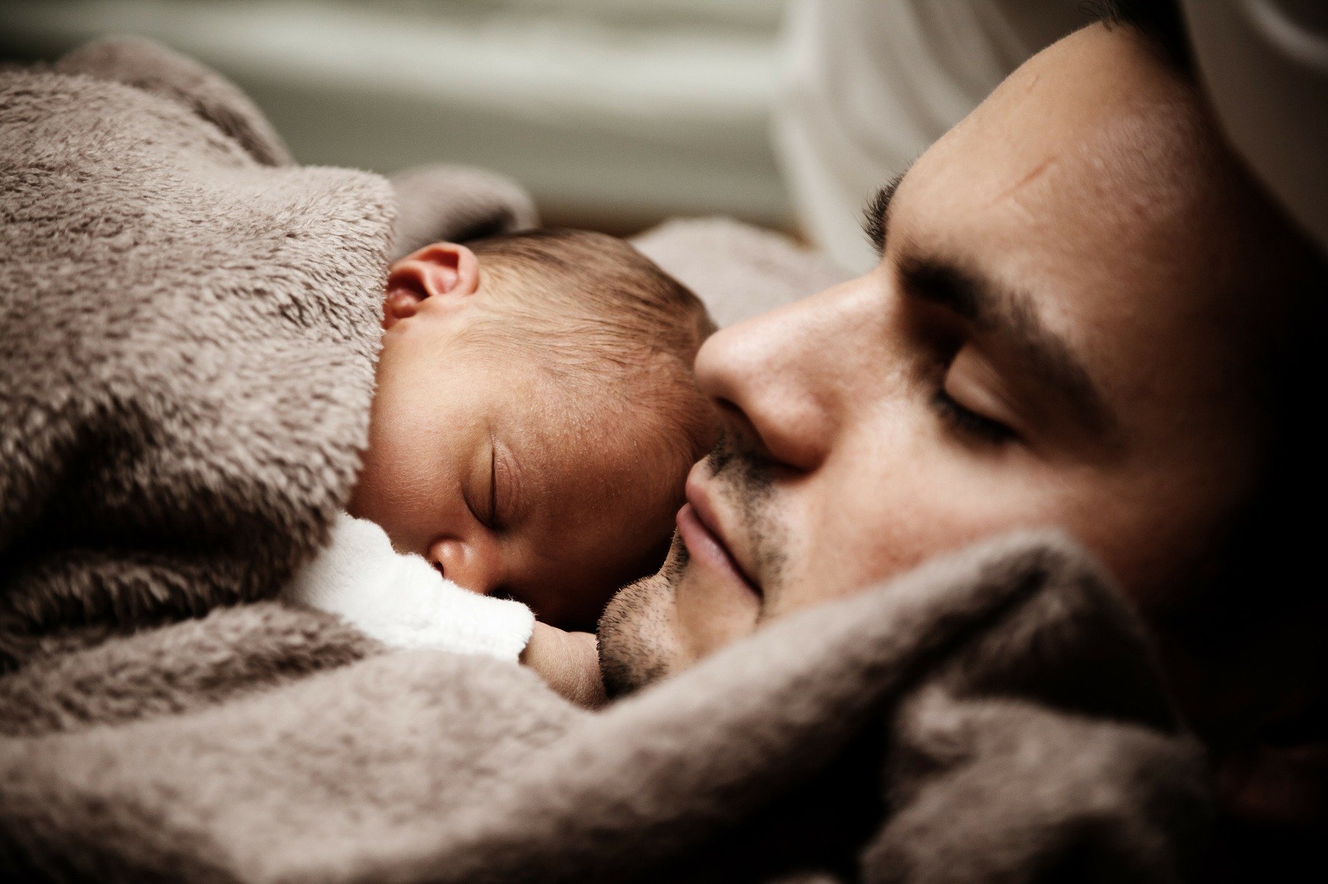 Man Holding Baby