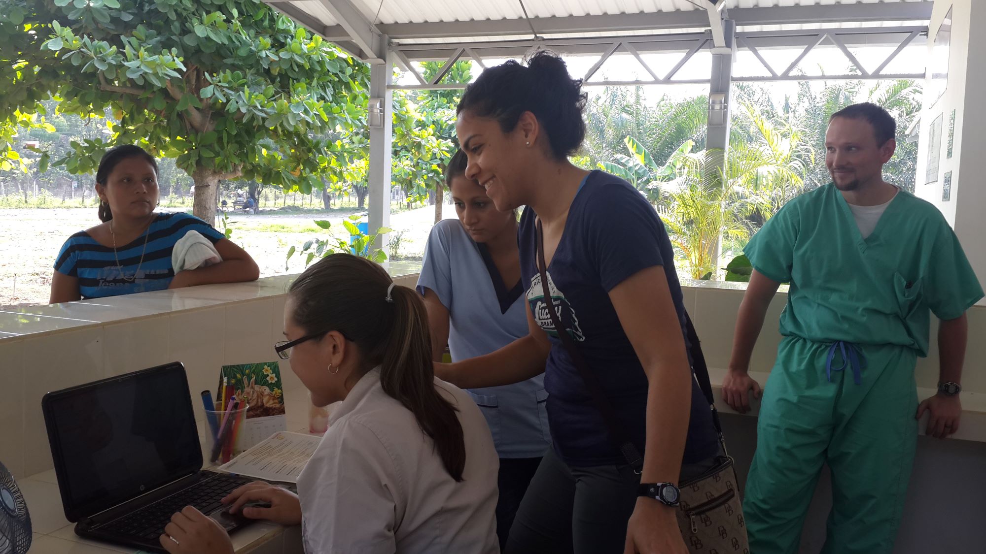 ghe staff with Guatemalan worker