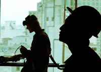 silhouette of construction workers