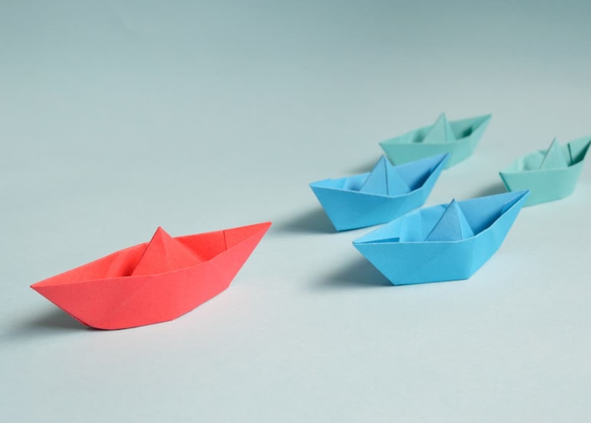 paper boats on table