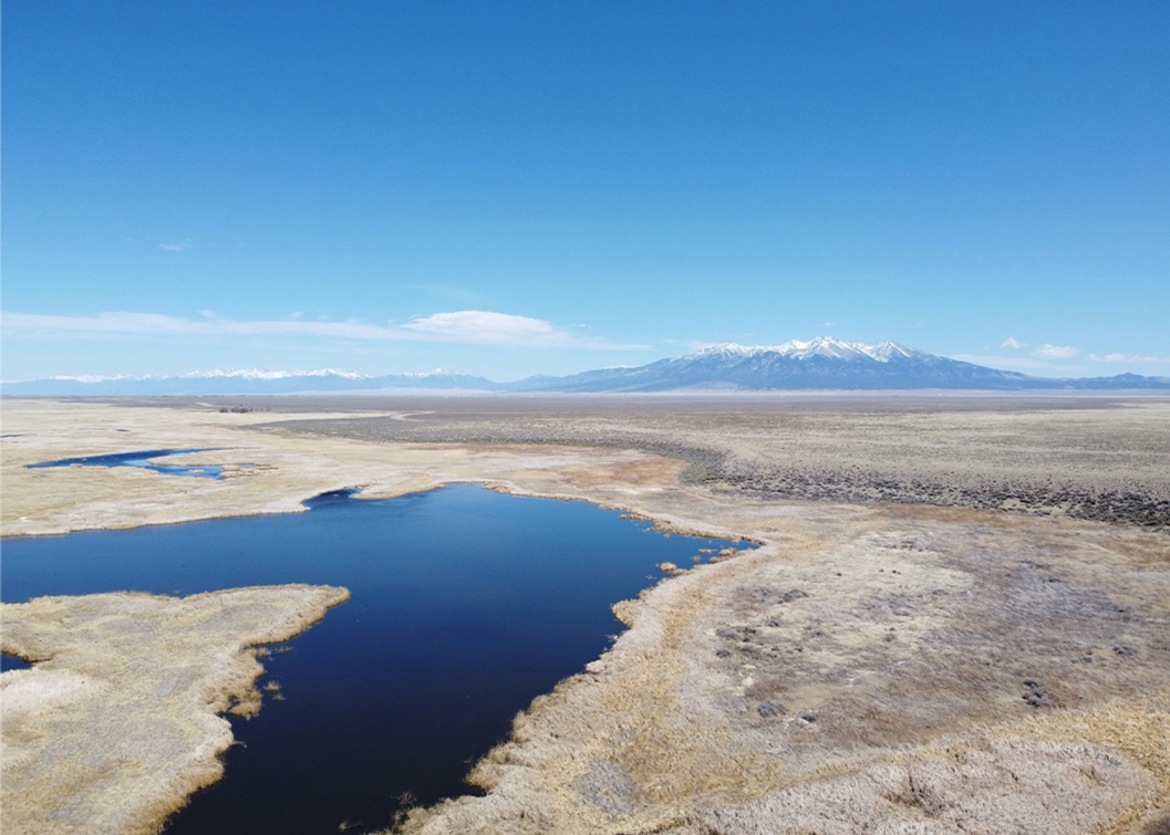 lake in front of mountain range