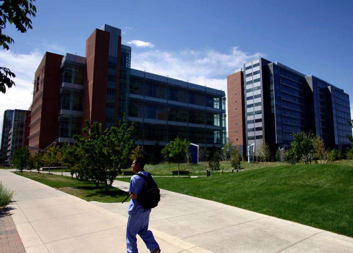 CU Anschutz campus with a student in the foreground