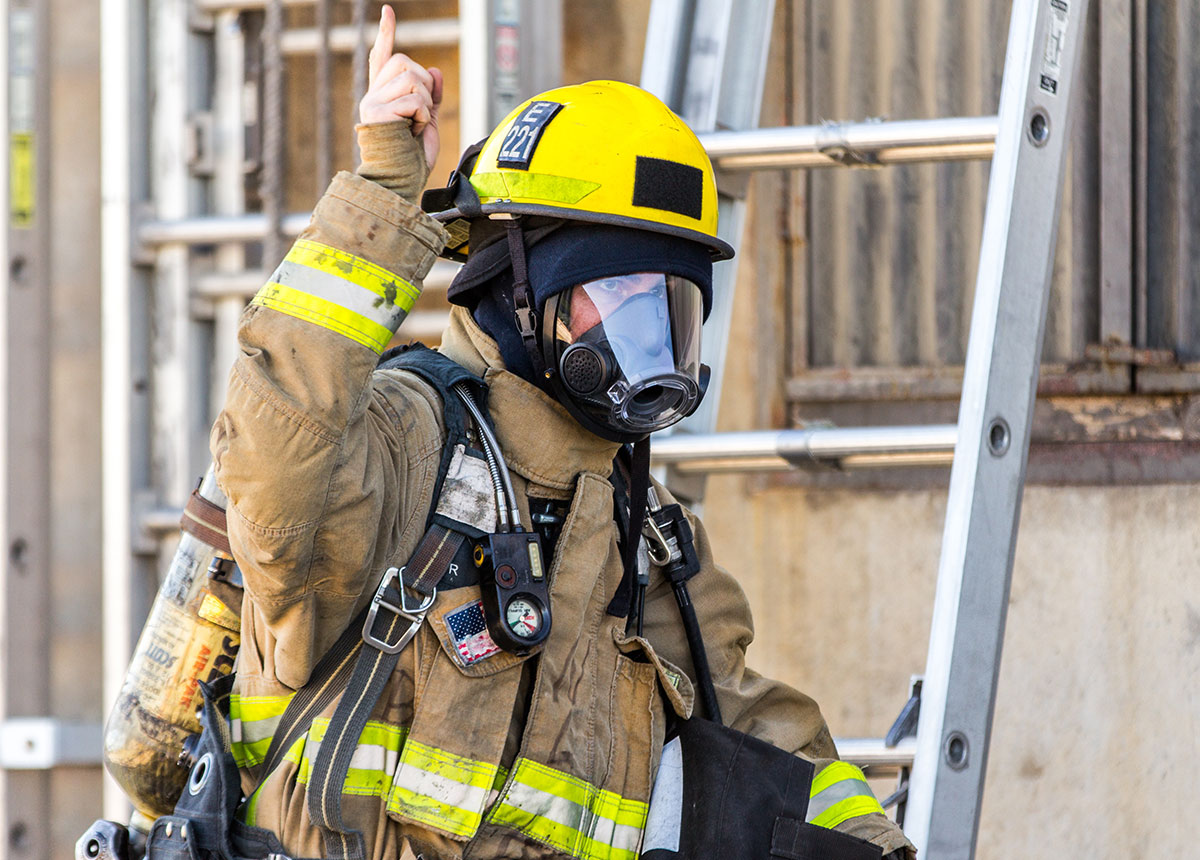 firefighter in protective gear