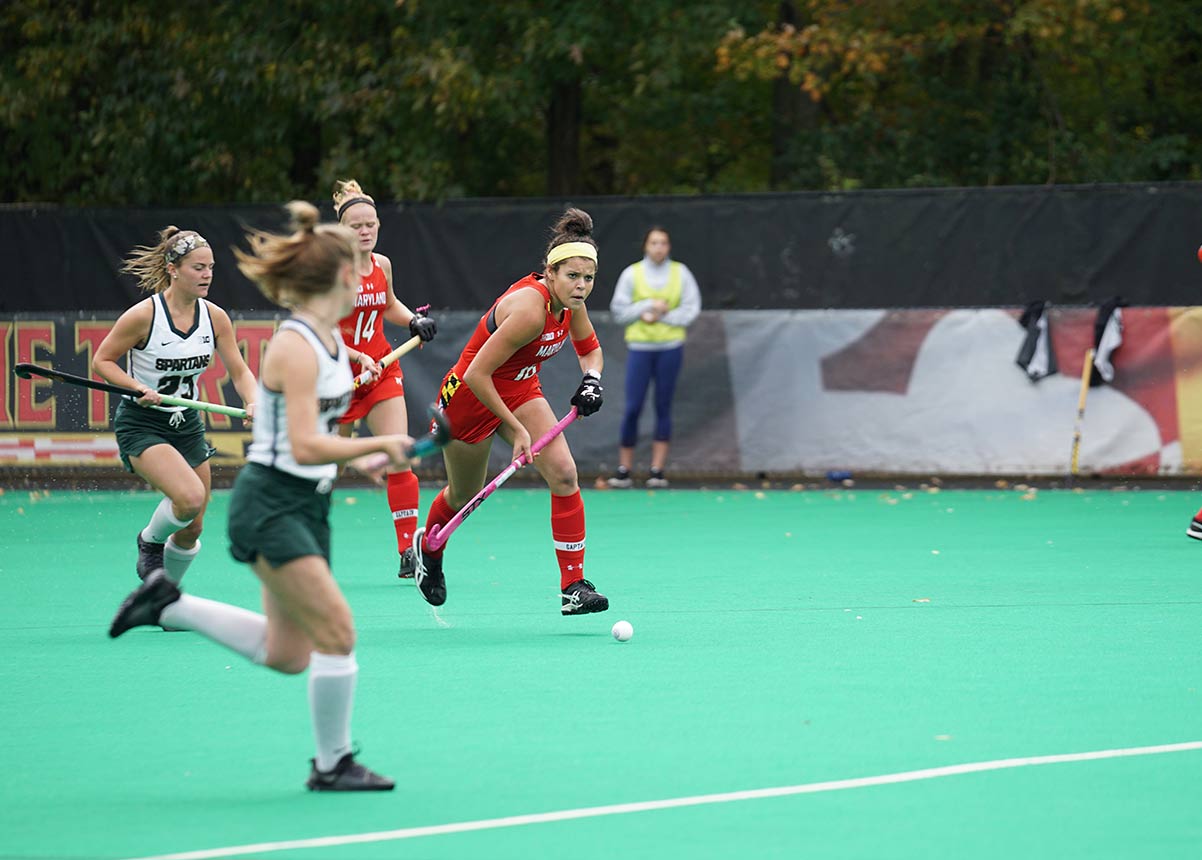 Women playing lacrosse