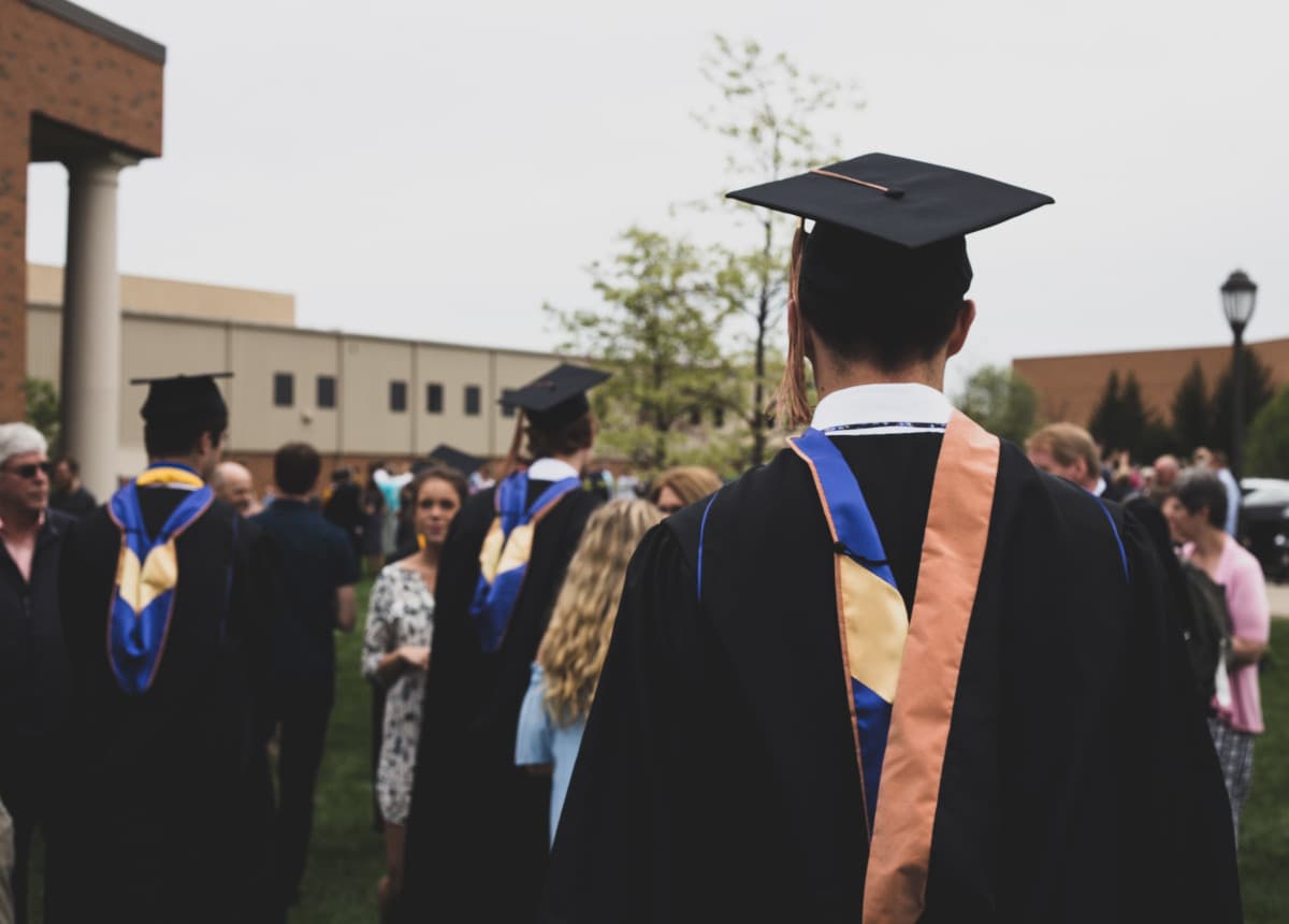 graduate student wearing regalia