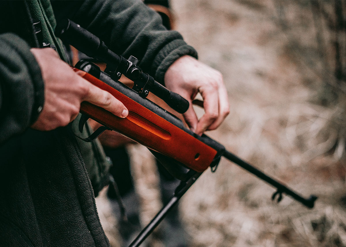 Man loading a rifle