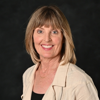 Woman smiling in headshot