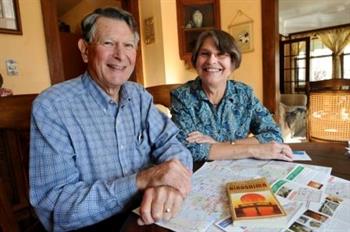 Bill and Susan Marine sitting at a table