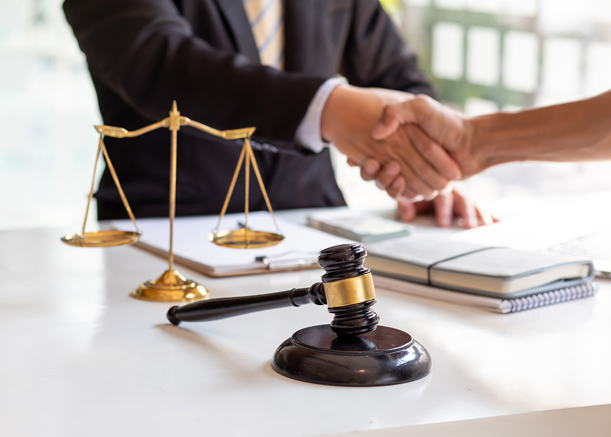 lawyer shaking hands with someone