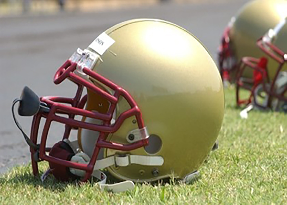 Football helmets on ground