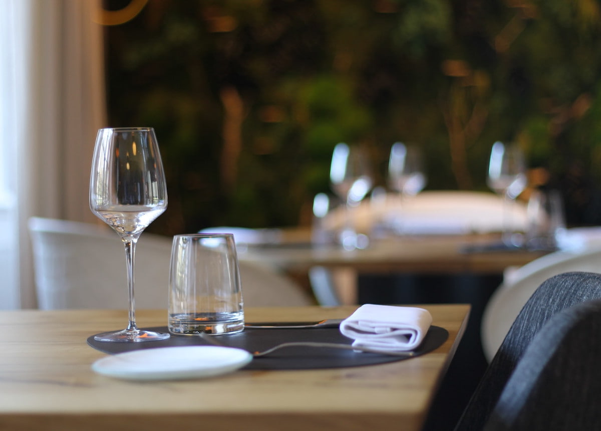 empty wine glass on restaurant table