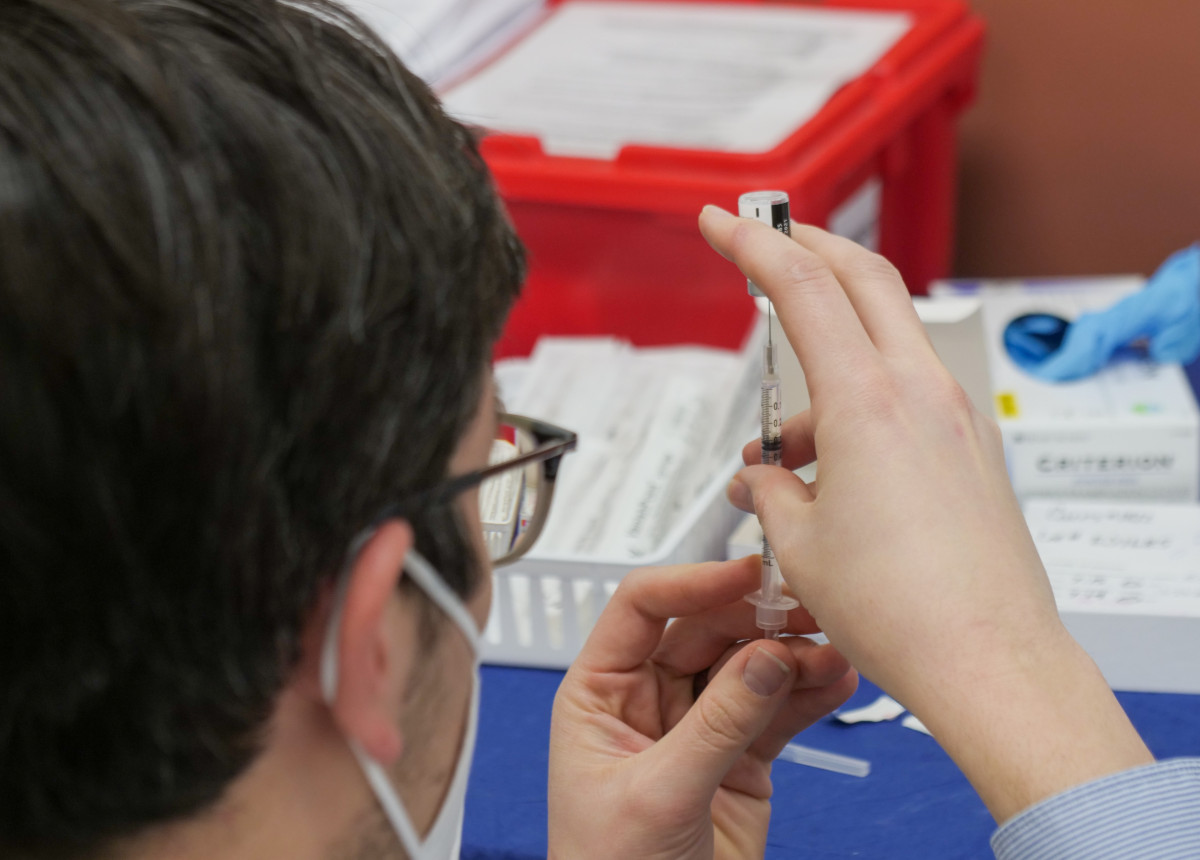 vaccine being prepped for injection