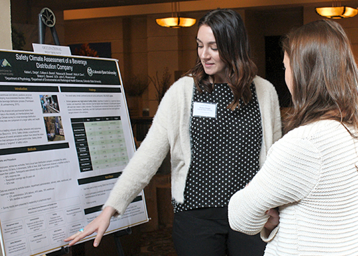 student presenting at research day