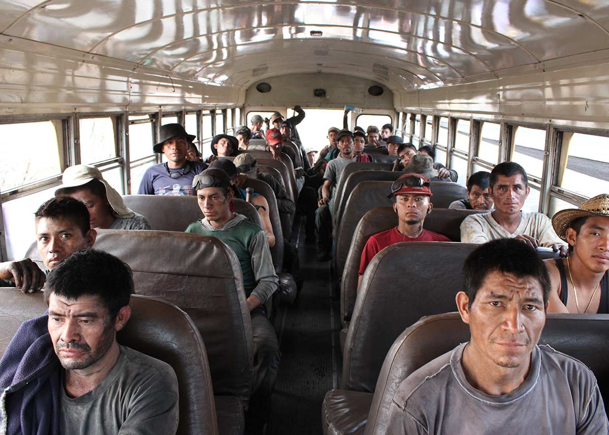 group of workers on a bus