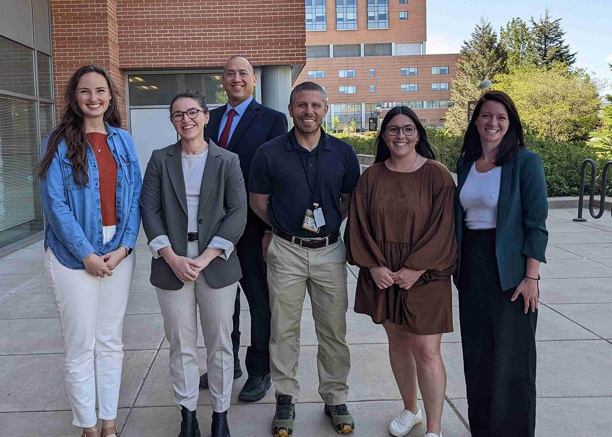 group of six MPH students who presented capstone project smiling on the CU Anschutz Campus