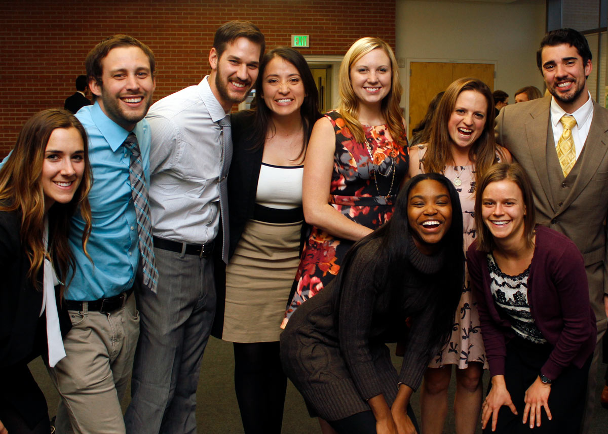 group of students smiling and standing together