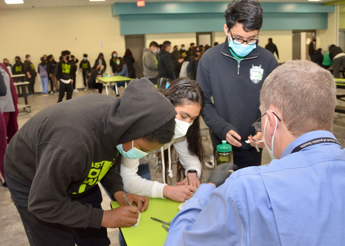 ColoradoSPH researchers conducting COVID-19 testing at an Aurora middle school