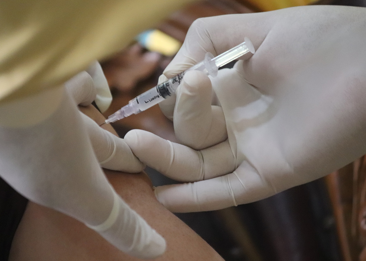 Close up of a person getting vaccinated