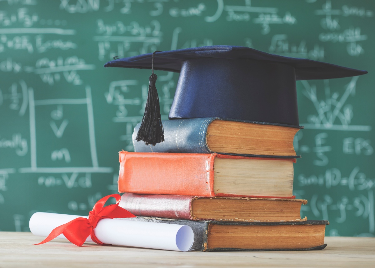 Books and graduation cap