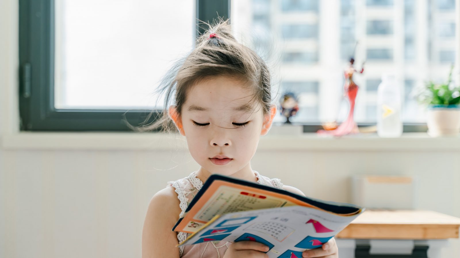 child reading book