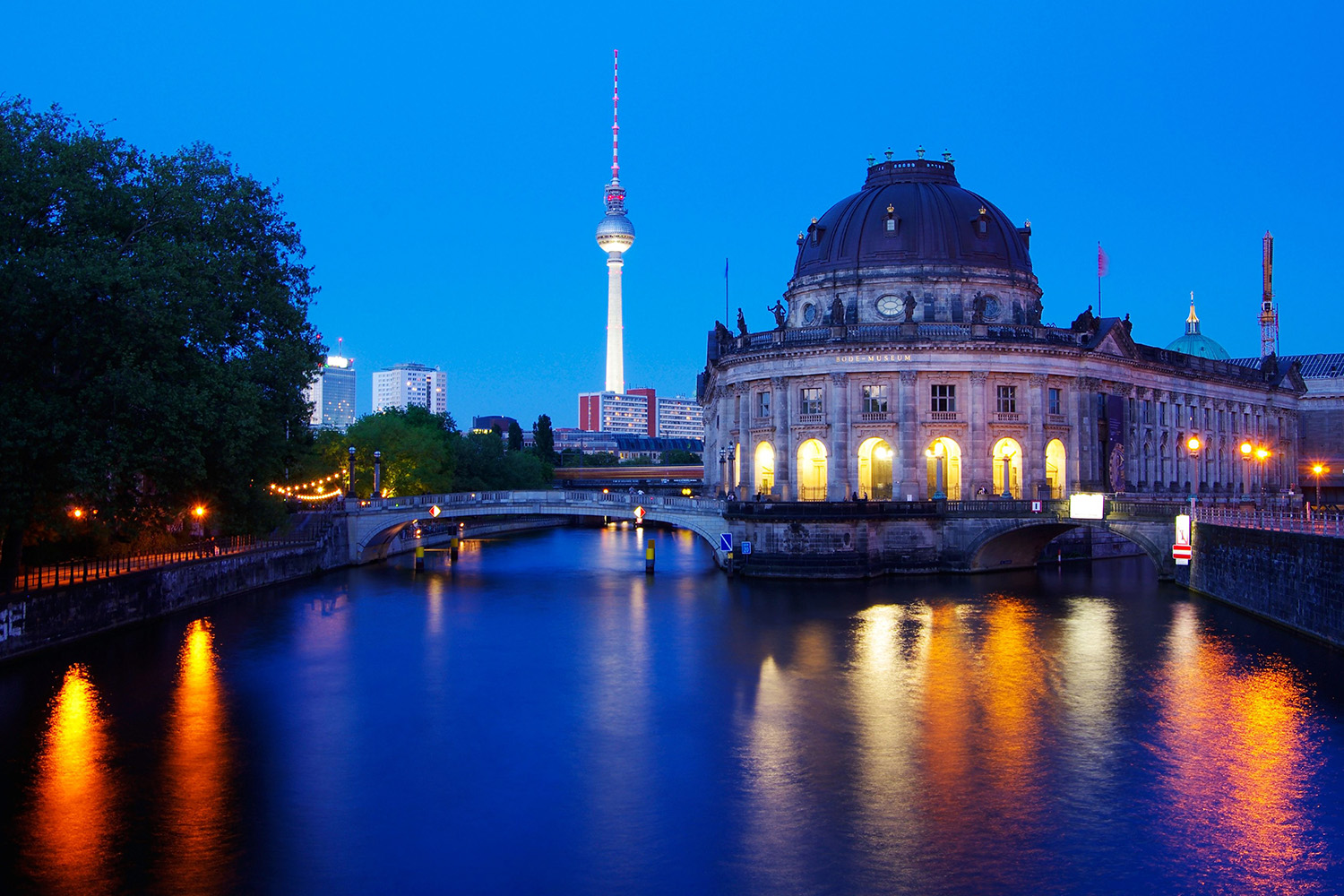 A photo in Berlin over the water with reflections