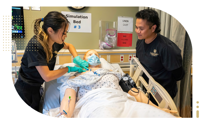 Female and male student nurses in simulation lab