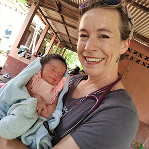 Erin Newton with baby in Guatemala