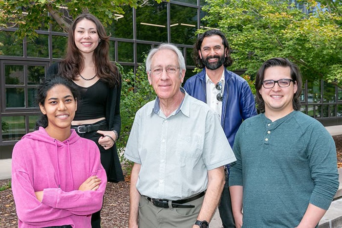 Dr. Erik Lucero with Professor Martin Huber and other CU Denver faculty.