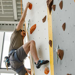 Man climbing a rock wall