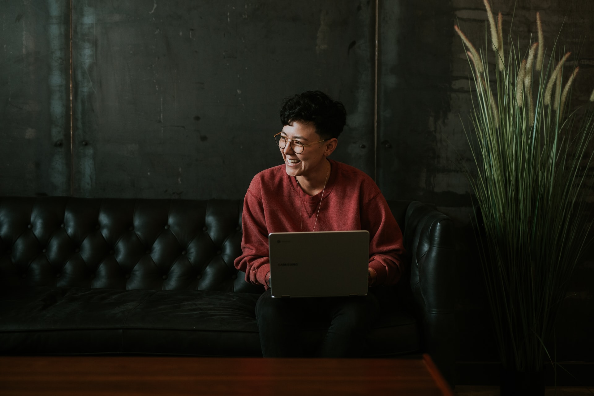 Person sitting with laptop