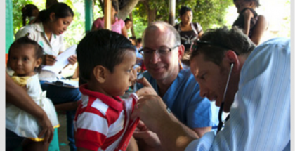 doctors examining children in Guatemala doctors examining children in Guatemala