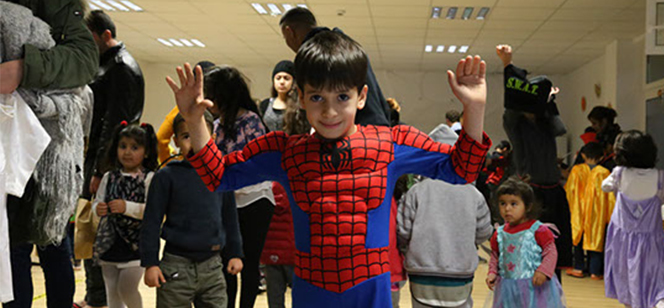 young boy in Spider Man costume young boy in Spider Man costume