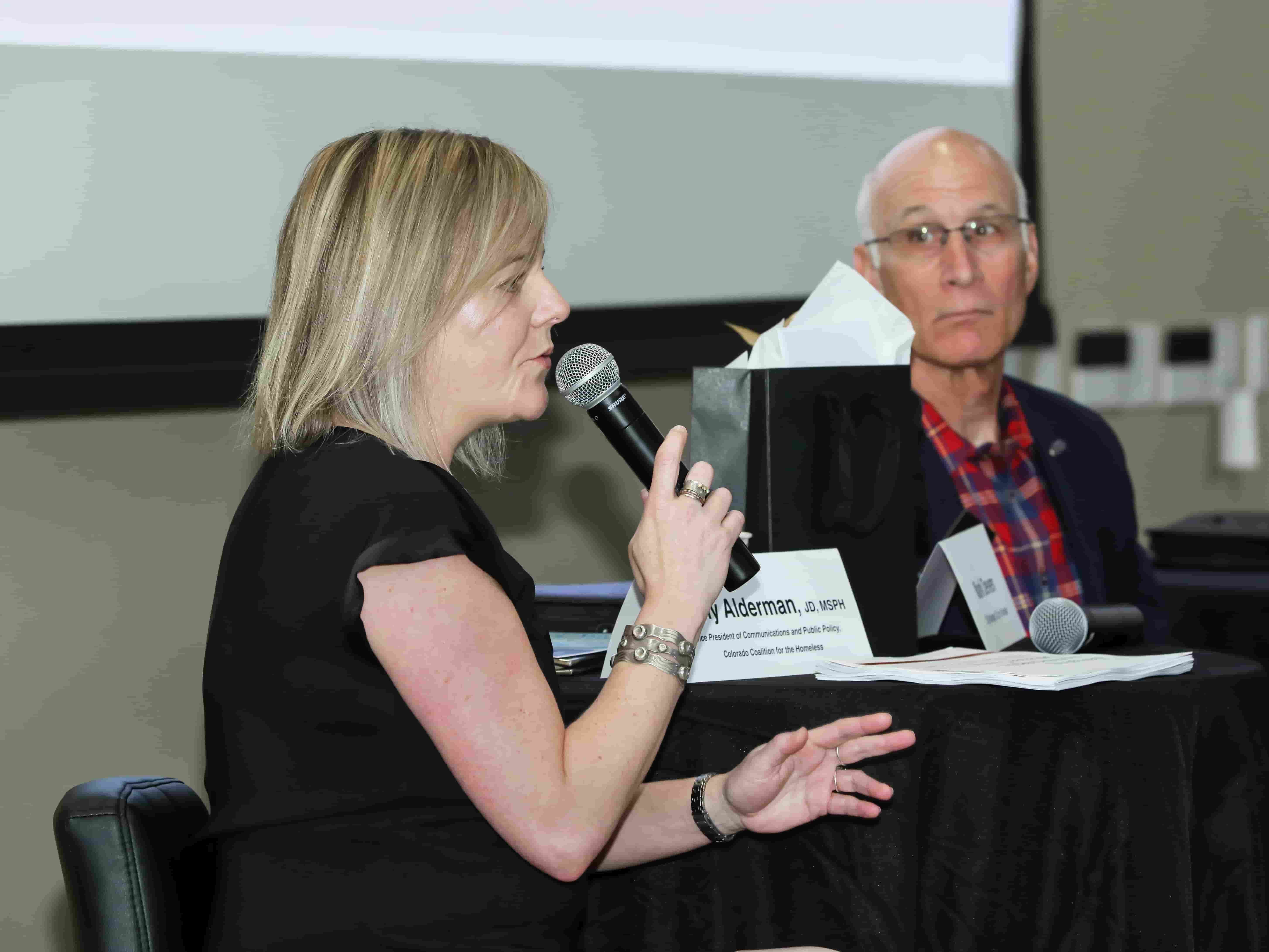 Panelist Cathy Alderman addressing the audience at First Friday Breakfast