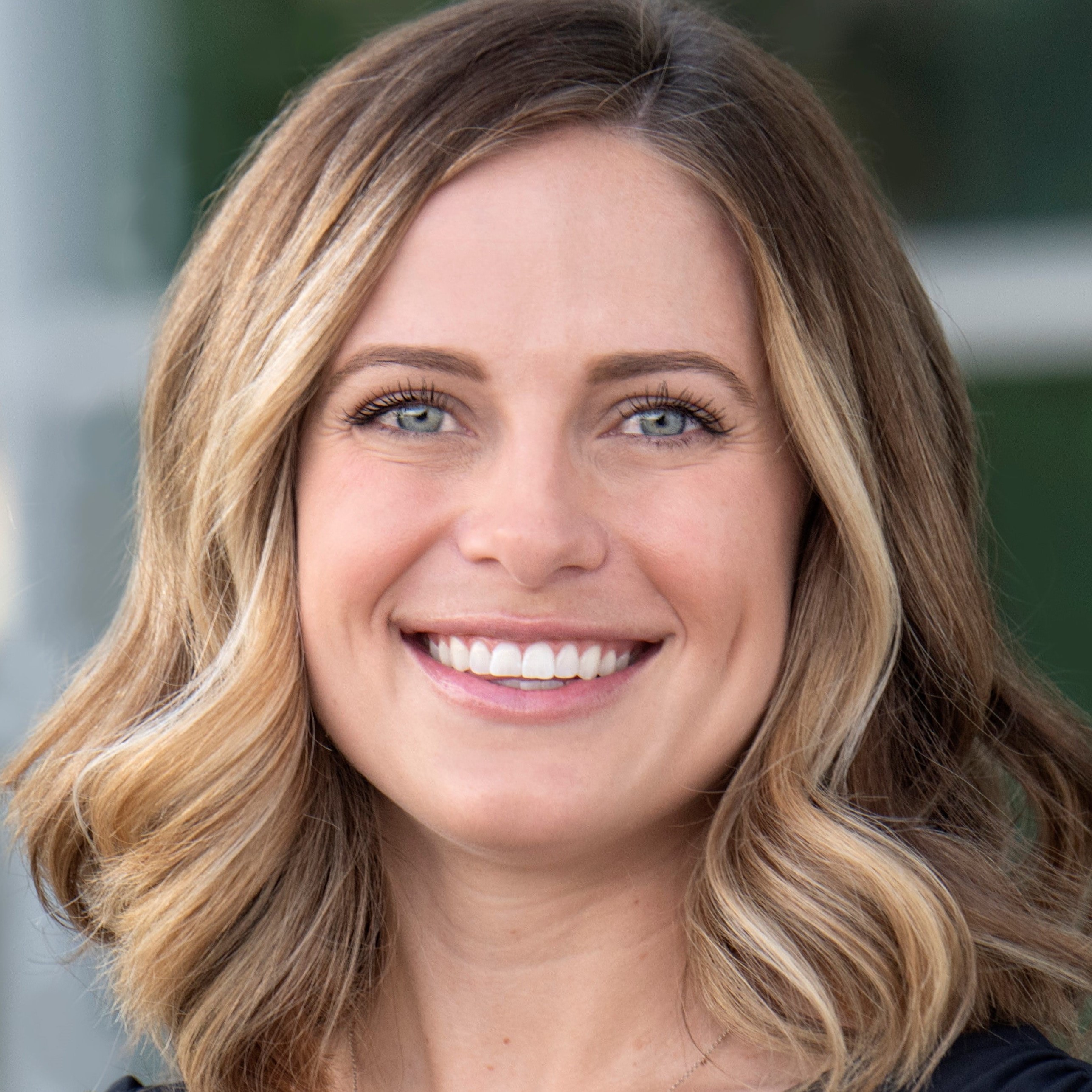 Close-up headshot of Paige Garman smiling