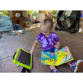 Young child using ViaPro to communicate.