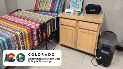 An Emergency battery charges medical equipment in a bedroom. logo, Colorado Department of health Care Policy and Financing